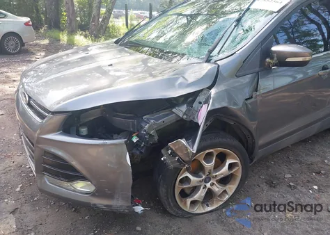 2014 Ford Escape Titanium z USA, uszkodzony, nr VIN 1FMCU0J91EUC89786